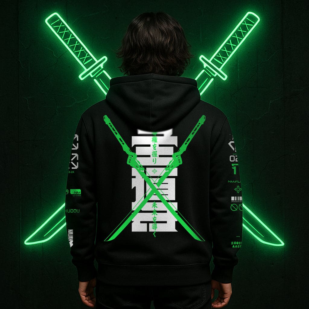Person wearing a black hoodie with neon green designs on the back, against a dark background.