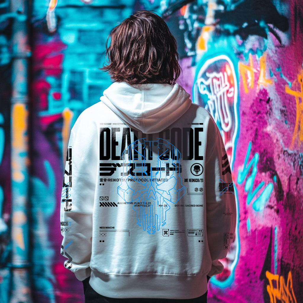 Person wearing a hoodie with 'DEATH CODE' design in front of a colorful graffiti wall.