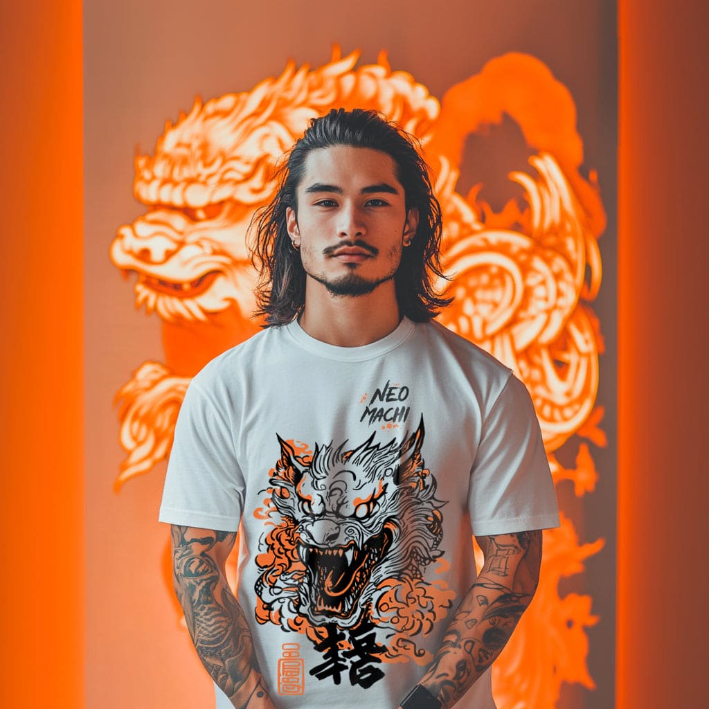 Person wearing a white t-shirt with a dragon design in front of an orange dragon background